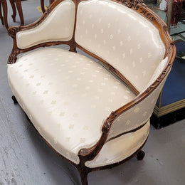 Pretty French Louis XV style small Walnut settee with very good upholstery. Sourced from France and in good original condition, please view photos of the upholstery as it helps form part of the description.