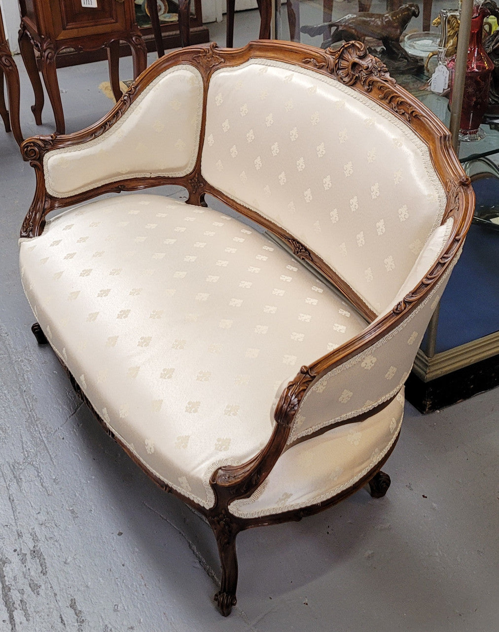 Pretty French Louis XV style small Walnut settee with very good upholstery. Sourced from France and in good original condition, please view photos of the upholstery as it helps form part of the description.