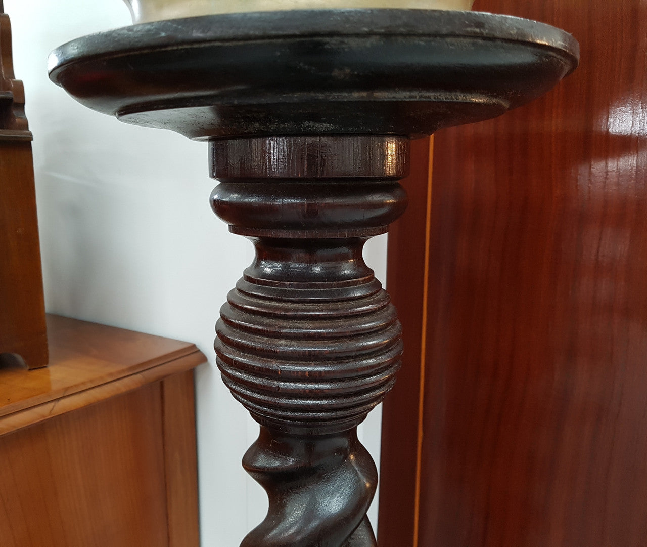 A Victorian round walnut barley twist pedestal/planter and in good original condition.