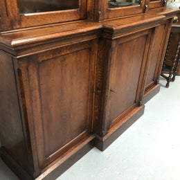 Amazing six-door Oak English bookcase sourced from France. The top section has adjustable shelves and plenty of storage space below which has fixed shelves. Keys and locks in working condition. In good original detailed condition. Circa 1880.