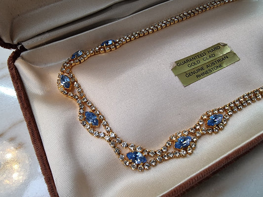 Beautiful vintage Austrian rhinestone necklace with lovely light blue stones and in good condition.