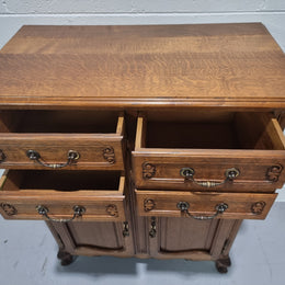 French Oak Louis XV style side cabinet. It has three drawers in total, two small drawers and one deep drawer. In good original detailed condition.