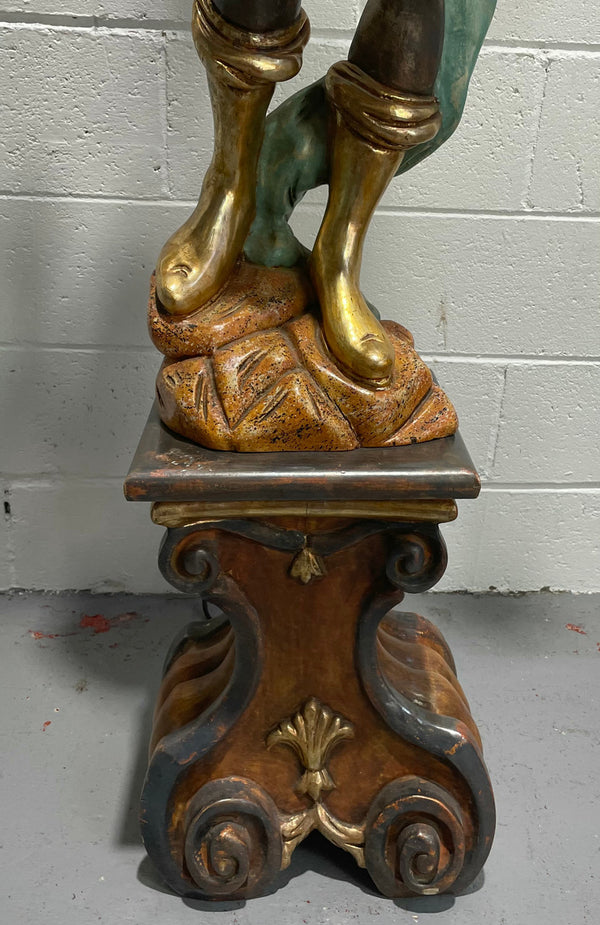 Sourced in France an Italian wooden carved Blackamoor lamp. Beautifully painted & gilded on a stunning base. It has been fully rewired to Australian standards.