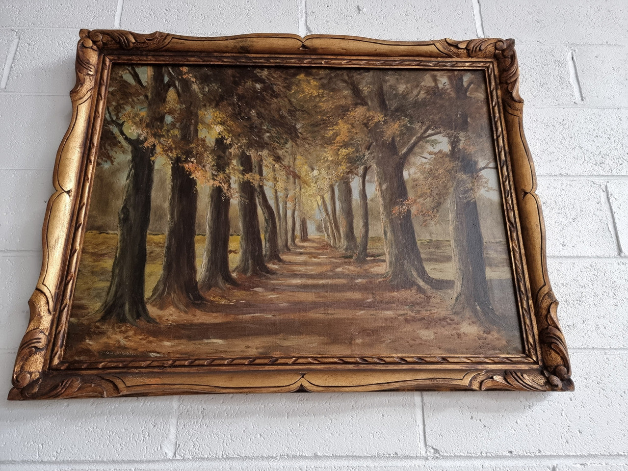 French signed oil on canvas depicting a charming landscape scene in a decorative gilt frame. It is in good original detailed condition and has been sourced from France.