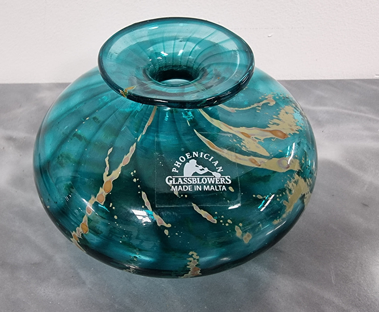 Stunning signed Phoenician glass vase made in Malta and still has original sticker. It is in good condition with no chips or cracks.