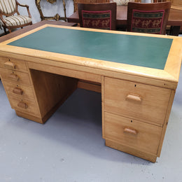 Parliament house desk made from Queensland maple. Desk has room numbers stamped to front. It's in good original condition. Purchased from a sale in old Parliament House in the late 1980's.