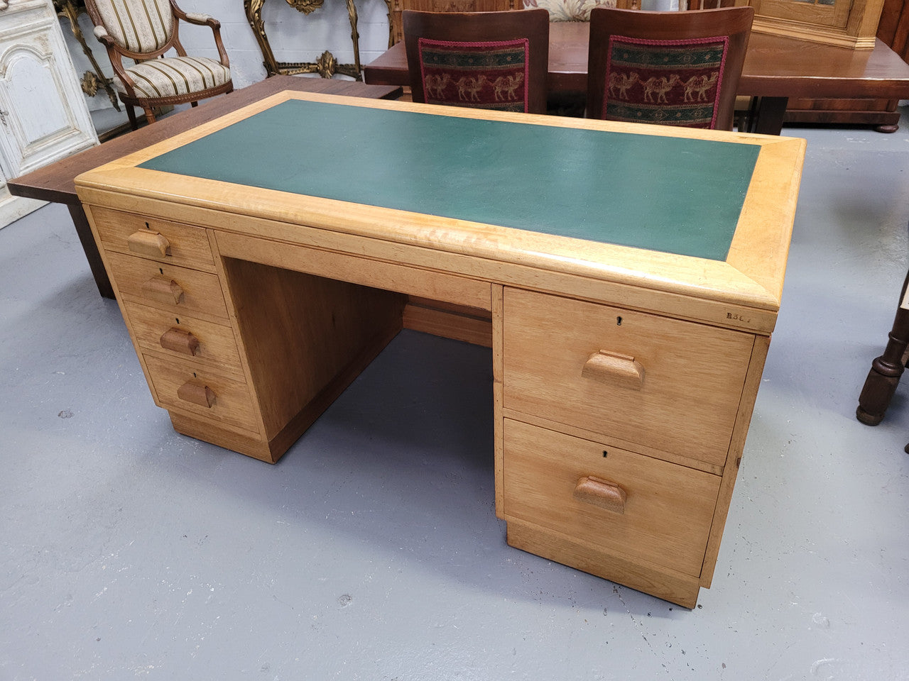 Parliament house desk made from Queensland maple. Desk has room numbers stamped to front. It's in good original condition. Purchased from a sale in old Parliament House in the late 1980's.