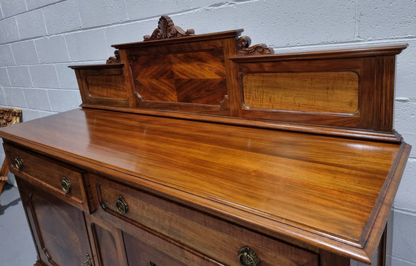 Fabulous Antique two door Blackwood and Fiddleback sideboard with lovely presence and also plenty of room for storage. In original detailed condition.