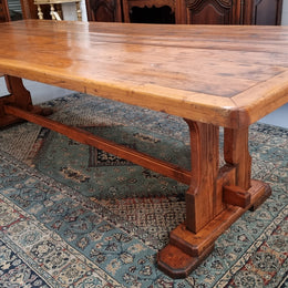Reclaimed Pine and Oregon stretcher base dining table. The top has an amazing patina and character. Can very comfortable seat 12 and is in good original detailed condition .