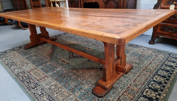 Reclaimed Pine and Oregon stretcher base dining table. The top has an amazing patina and character. Can very comfortable seat 12 and is in good original detailed condition .