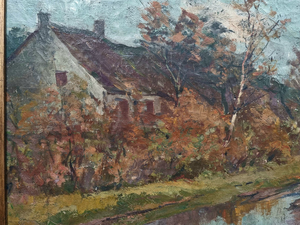 French signed country scene oil on canvas in a lovely decorative frame. In good original condition.