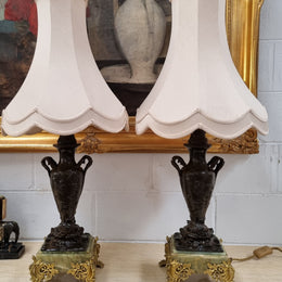 Pair of decorative Antique French gilt bronzed metal and marble table lamps. In good original detailed working condition.