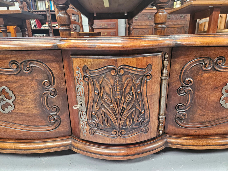 Appealing French Louis XVth style walnut converted TV unit.  Central carved  door & 2 Sliding Cupboards. In good condition.