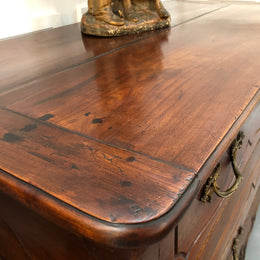 Beautiful 18th Century French all Cherrywood three drawer commode with beautiful ormolu mounts and handles. It is in good original detailed condition.