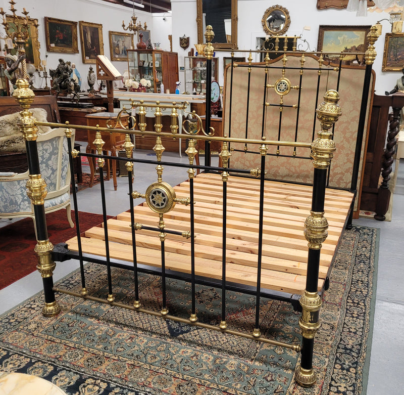 Rare Antique cast iron and brass Victorian queen size bed. Comes with custom made slats.  It has been sourced locally and is in good original condition.