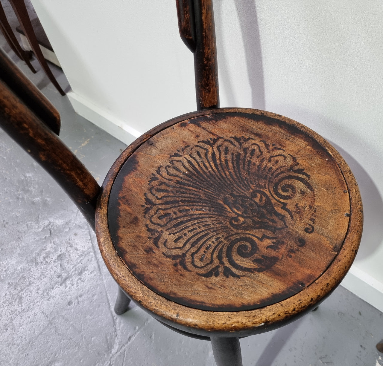 Rare petite cafe Bentwood chairs with original shell embossed seats. They are in very good original condition. They would make great addition to your breakfast bar.