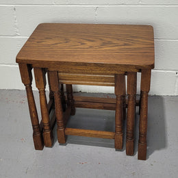 Lovely tudor oak style three nest tables. Circa 1950, In good original detailed condition.