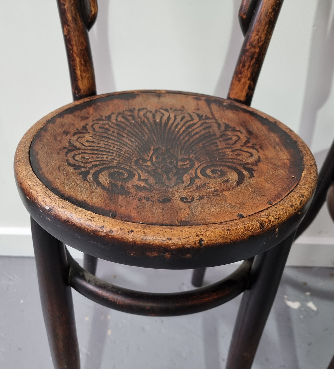 Rare petite cafe Bentwood chairs with original shell embossed seats. They are in very good original condition. They would make great addition to your breakfast bar.