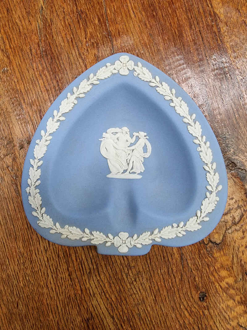 Delicate Spade shape Blue/White Wedgwood Jasper Ware small bowl decorated with Grecian ladies. In good condition please view photos as they help form part of the description.