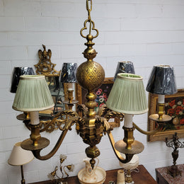 Stunning six arm French bronze chandelier. It can be used with or without shades. It has been fully rewired to Australian standards. It is in good original detailed condition.