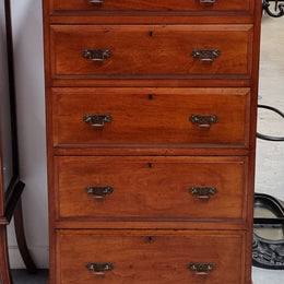 Lovely Antique English walnut tallboy/ chest of drawers. There are five drawers which all differ in sizes and have lovely hardware. It is in good original detailed condition.