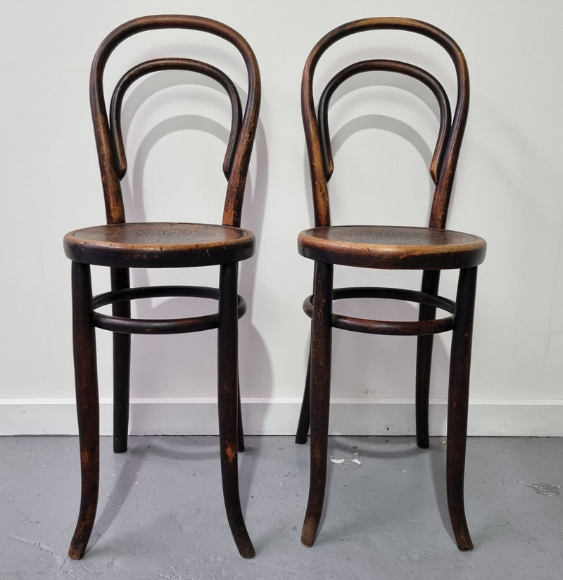 Rare petite cafe Bentwood chairs with original shell embossed seats. They are in very good original condition. They would make great addition to your breakfast bar.