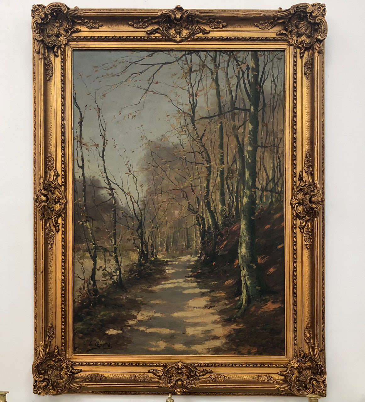 Beautiful Antique French oil on canvas of a path of trees, in a fabulous ornate frame and in good condition.