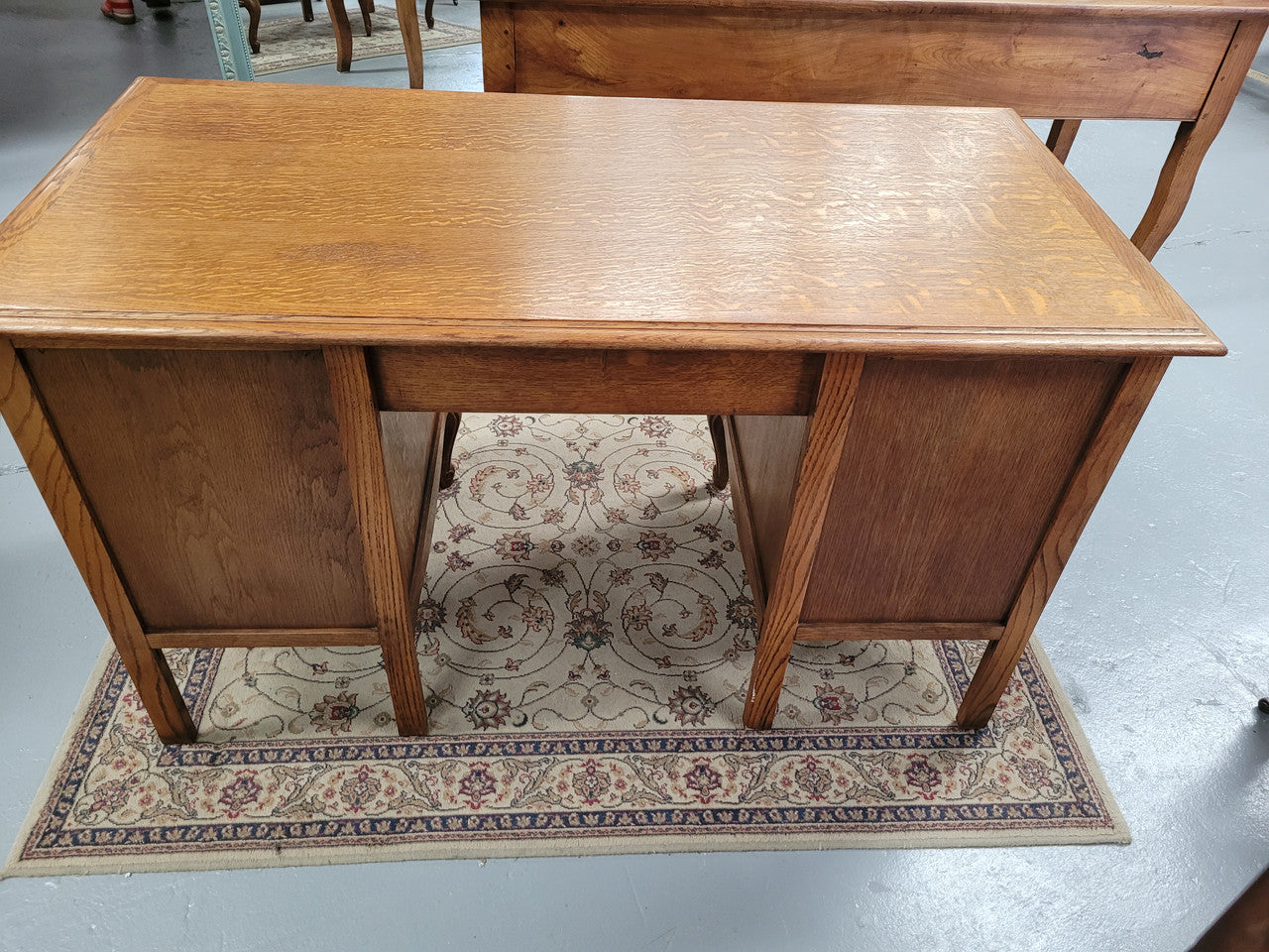 Beautifully carved French oak small desk with three drawers and a cupboard for all your storage needs. In good original condition. Great size for small spaces.