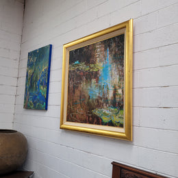 A beautiful Framed oil on canvas in vibrant colours and framed in a lovely gold frame. This piece is signed by artist John Cumming from "The Mill Gallery" and still has its original gallery card as shown in picture. It is in good original condition.