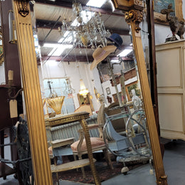 French Louis XVI style Napoleon III (1870’s) gilt mantle mirror. Beautifully carved and decorated with original bevelled mirror showing signs of age. It is in good original detailed condition and has been sourced from France.