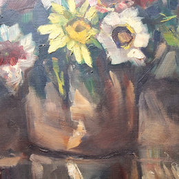 Sourced in France is this beautiful floral oil painting on canvas and framed in a lovely decorative frame. It is in good original condition.