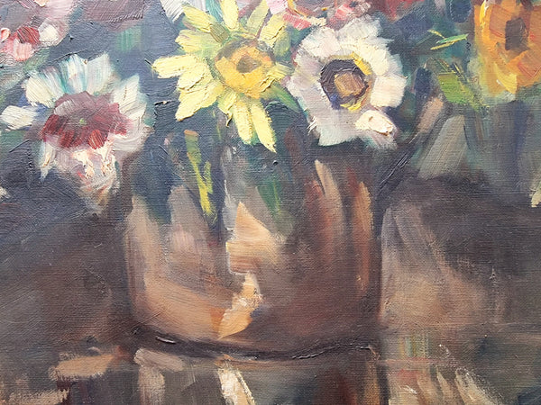 Sourced in France is this beautiful floral oil painting on canvas and framed in a lovely decorative frame. It is in good original condition.
