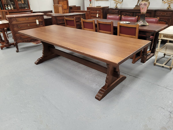 Sensational long French Oak farmhouse table of large proportions on a stretcher base. It has been fully restored with a hard oil water resistant finish. This fabulous table would seat 10 to 12 people.
