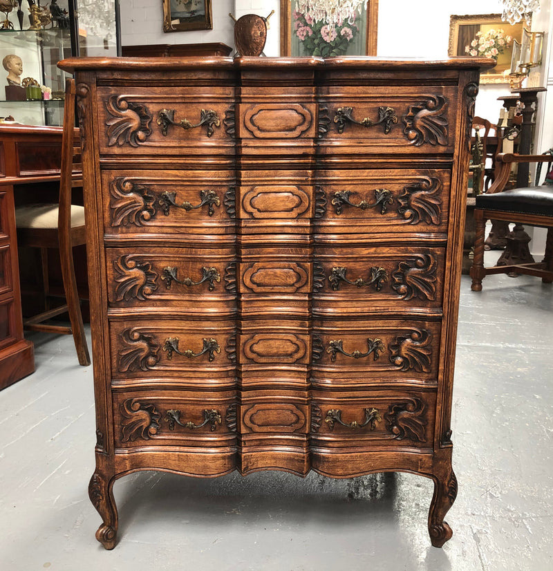 French Oak miniature chest of five drawers with serpentine shaped front. In very good original detailed condition.