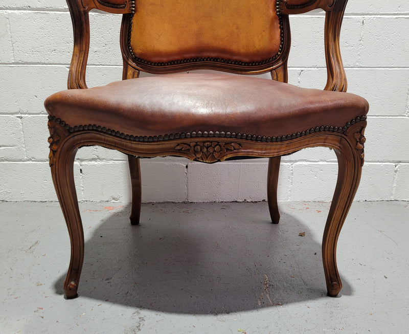 French Walnut Louis XV style desk chair with faux leather upholstery. The upholstery is in good original condition and very comfortable to sit in.