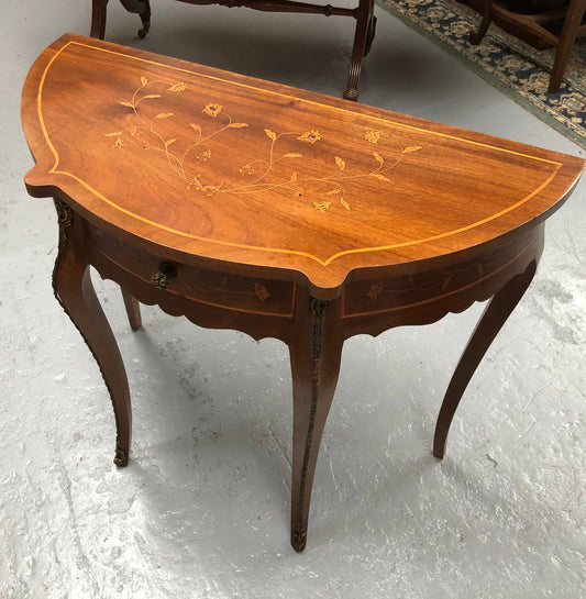 Stunning small inlaid French Walnut Louis XV style hall table with ormolu mounts and beautiful details. It has been sourced from France and is in good orignal detailed condition.