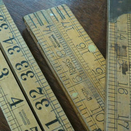 A vintage boxwood rulers in inches. There are two that measure to 24 inches, one measures and 36 inches and all in good condition. Note, price is for each one.