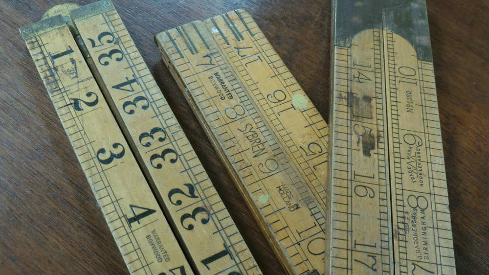 A vintage boxwood rulers in inches. There are two that measure to 24 inches, one measures and 36 inches and all in good condition. Note, price is for each one.