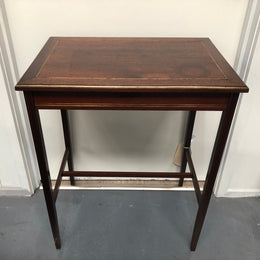Elegant rectangular mahogany French brass inlaid occasional table. Is in good original condition.