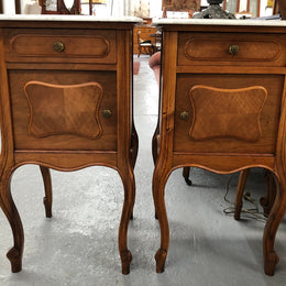 A beautiful pair of French walnut, marble top bedsides with a drawer and cupboard in good condition.