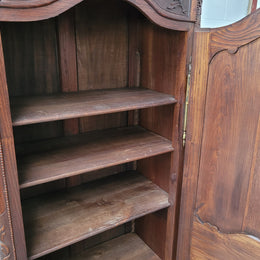 French Oak "Bonnetiere" cupboard of pleasing small proportions. It has four adjustable shelves and plenty of storage space