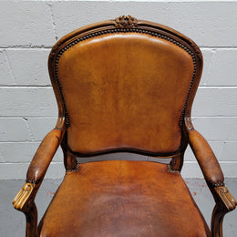 French Walnut Louis XV style desk chair with faux leather upholstery. The upholstery is in good original condition and very comfortable to sit in.