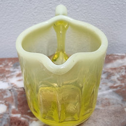 A fabulous rare Vaseline glass small jug and sugar bowl in good original condition.
