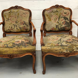 Pair of French Walnut Tapestry covered armchairs. They are in good original detailed condition. Slight wear and tear to fabric but still in good condition please view photos.