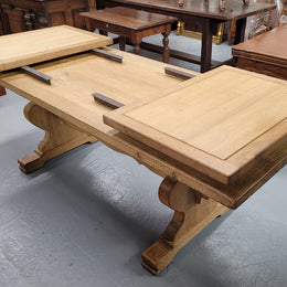 Stunning French Oak Farmhouse table with two extension leaves. When fully extended the table measures to a massive 339.5 cm long. Sourced from France and in good original detailed condition.