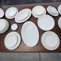 Limoge "Haviland" large white part dinner service. Includes some white service with gilt decoration. Although most items are in good condition please note two plates do have small chips. We are able to supply more photos on request.