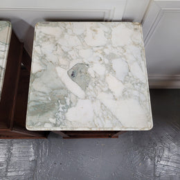 Pair of Antique French Oak Louis XVI style marble top bedside cabinets. They have decorative inlay and have been sourced from France. They are in good original detailed condition.