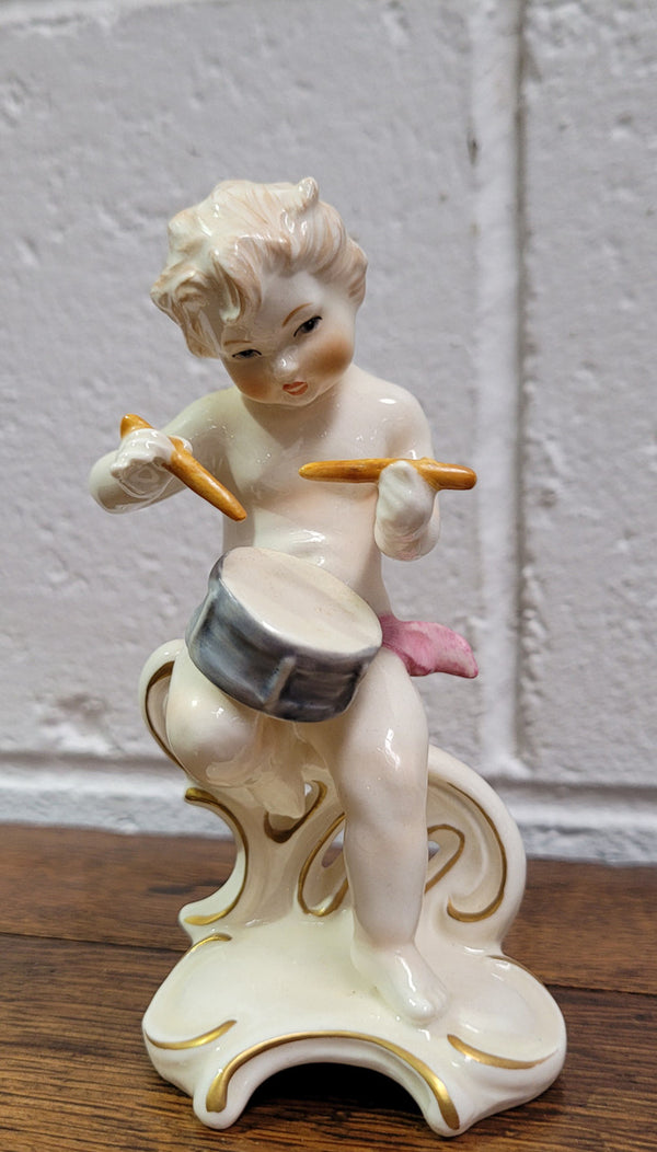 Vintage Goebel cherub drummer boy numbered on base 12 010 17 “Goebel W. Germany” In good original condition, please view photos as they help form part of the description.