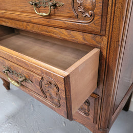 French Louis XV style Oak three drawer chest with wooden top. It has been sourced from France and is in good original detailed condition.