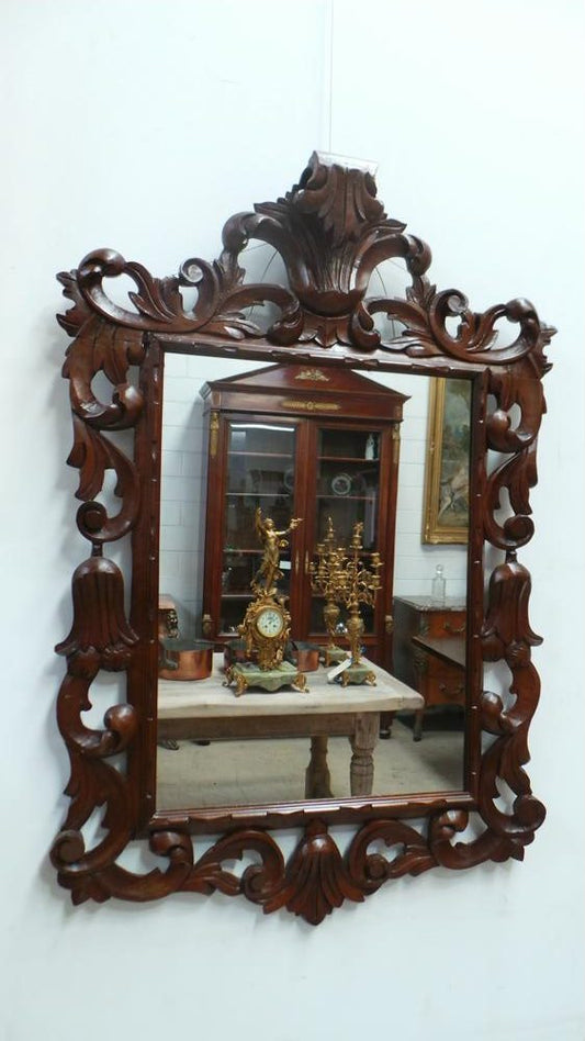 Beautiful decorative walnut finish mirror in the louis XIV style in great condition.